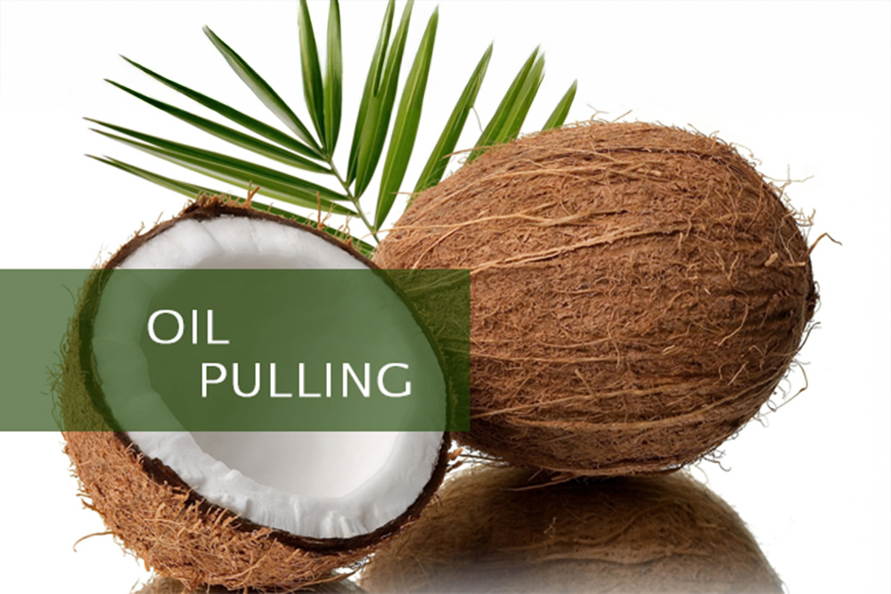 coconut oil and spoon used for oil pulling to support natural oral hygiene